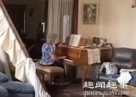 黎巴嫩奶奶在破损房间中弹钢琴 具体是什么情况?