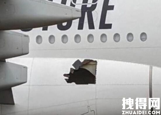 阿联酋客机落地后发现机身有大破洞 究竟是怎么回事？